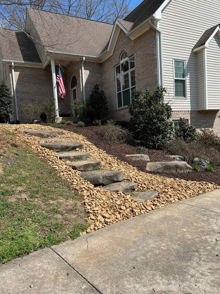 River-rock pathway with natural stone steppers
